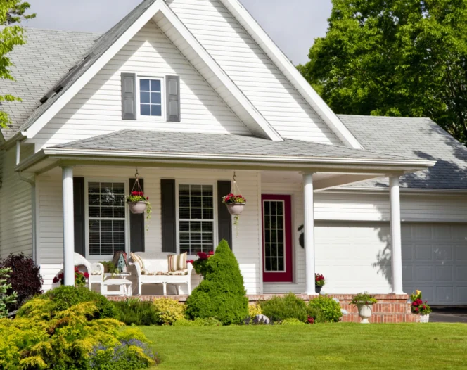 white modern small house with outdoor lawn